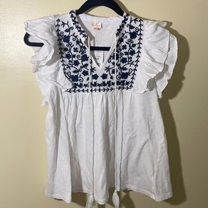 White cap sleeve blouse